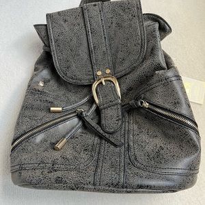 NWT- Vegan leather knapsack in charcoal grey. Grey/white stripes interior